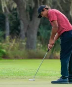 Tiger Woods a Elin Nordegren. Golfový triumf syna Charlieho spojuje rodinu