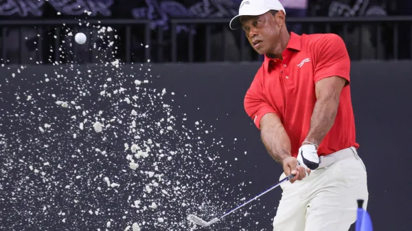 Video: Tiger Woods a Vanessa Trump. Polibek pro štěstí k výhře v TGL nepomohl