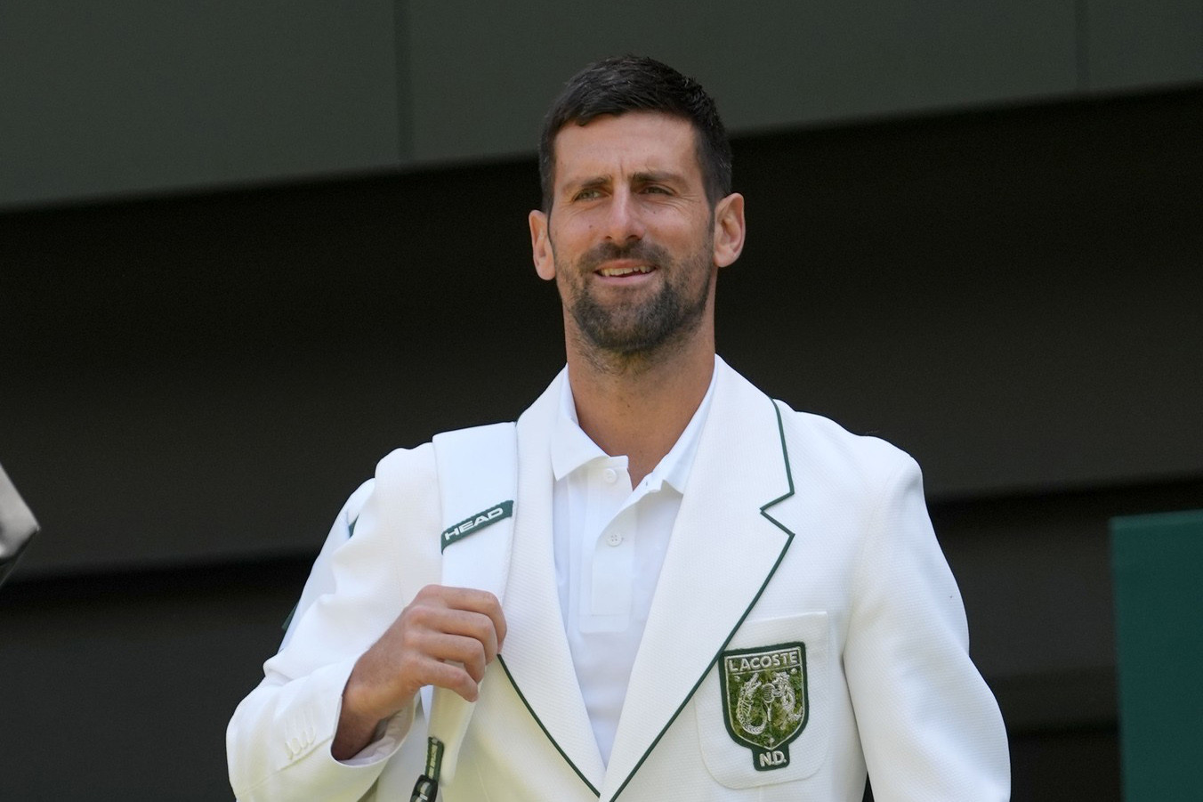 Novak Djoković po svém vítězství ve Wimbledonu vyzval Roryho McIlroye k tenisovému souboji o ikonické zelené sako vítěze Masters